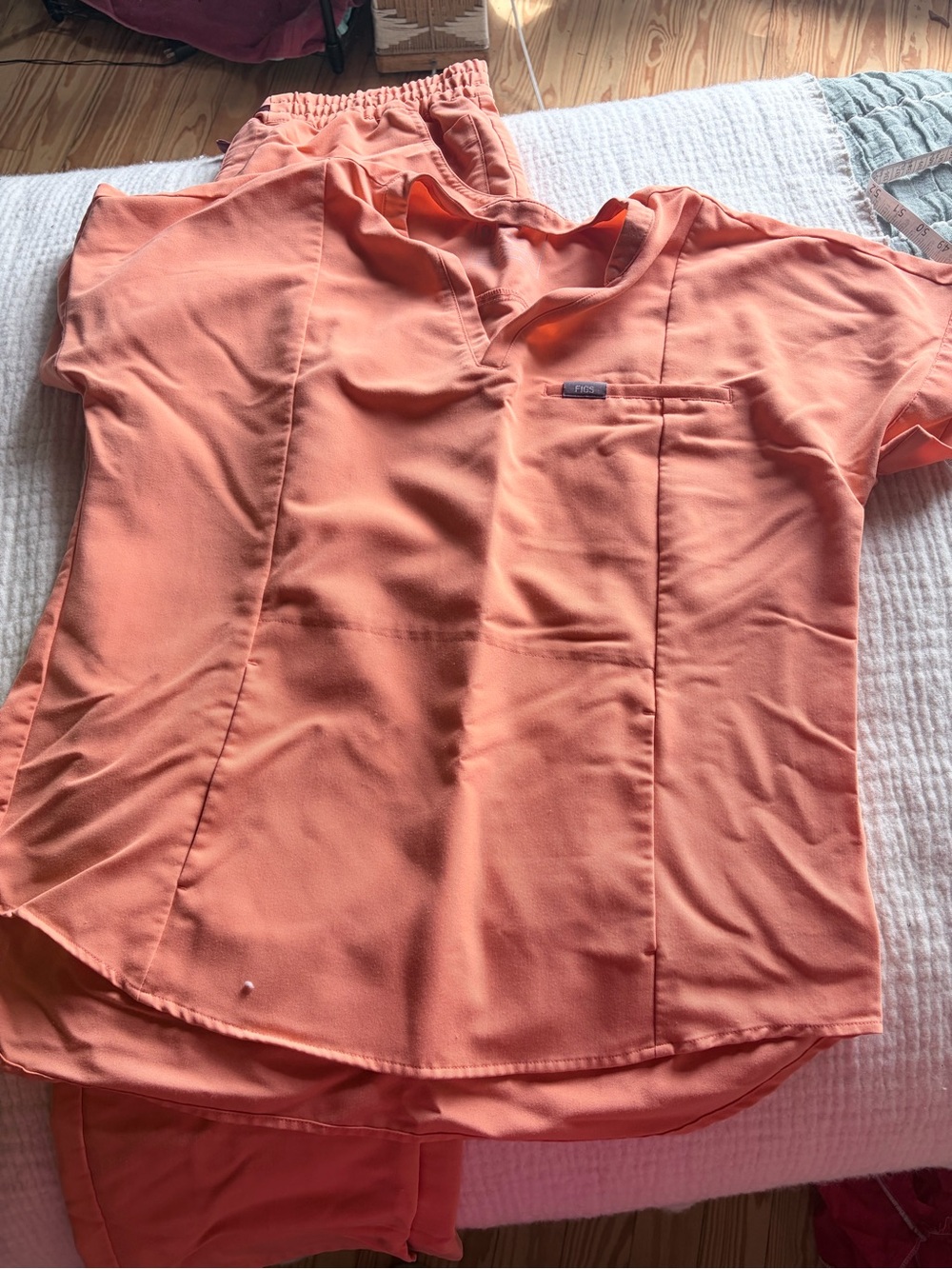 Figs women’s V-Neck Scrub Top and pants in Coral Orange